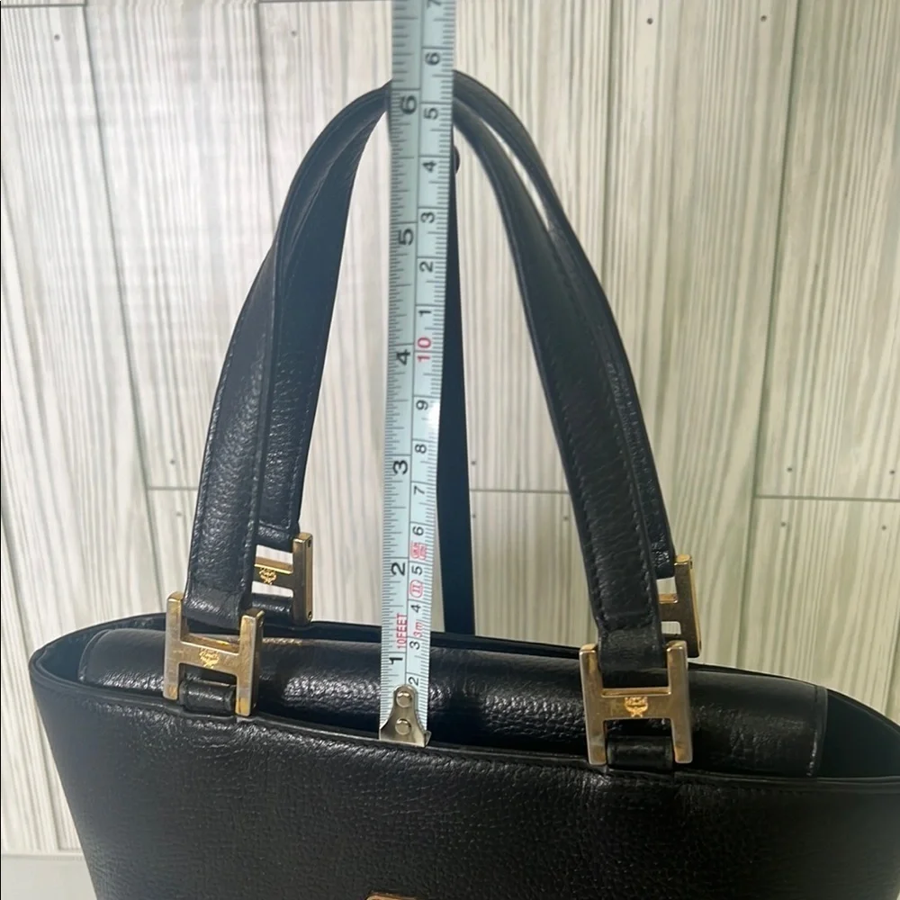 MCM Black Mini Tote with Gold Accents and Trapezoid Shape